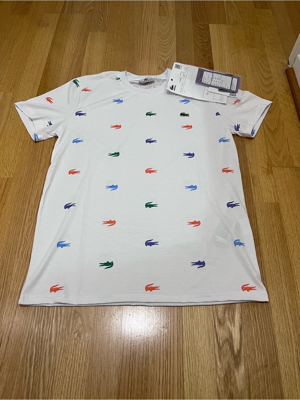 Lacoste Crew Neck T
Logo All Over
Casusual Shirt
Size XL for Men